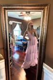 Purchased this for my friends wedding because we were instructed to wear lavender. The color is so perfect! (Although I'd call it more lilac/warm toned) Love the flow and comfort of this dress and I can already tell dancing in it will be so fun with the tiers. I definitely will need to have it hemmed which is expected because I'm 5ft, but the bust is also super big. I plan to have the bust/straps altered into twisted straps. I've already gotten compliments and haven't even worn it out yet! - Danielle K.