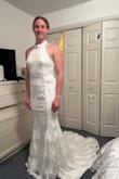 This is an amazing dress I ordered the large first and it fit perfectly but I have a more athletic build so it was a bit tight on my thighs. I ordered the XL and am getting it altered to get that extra tiny space I needed. Both sizes needed the neck altered if it was up to me it was a little big around the neck and I thought it should sit higher and tighter which helps bring everything up in the dress. Overall I love it the quality is great. - Hannah W.