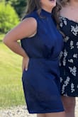 Based on the size chart, I originally ordered a large, which fit if I wanted to do nothing but stand all evening. The bottom is significantly more fitted than the top (which you can wear a regular bra with!). I'd recommend an extra set of hands on deck to button the neck area. - Olivia G.