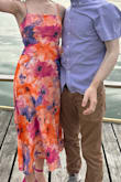 I bought this dress for an outdoor summer wedding and it was absolutely stunning and perfect for the event! It is lightweight and the colors are gorgeous! I got lots of compliments on this dress! The only negative I have is that the straps are very thin and they are an itchy material. They were a bit uncomfortable and I was worried they were going to break, but overall still really stunning! - Alexis C.