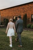 I wore this dress for the latter half of my reception and photos, and it was perfect for me!!! Not thin fabric, but comfortable and good quality. Looked great in photos, too. I am petite but more pear shaped, and I was not concerned with the length of this dress in the back at all! If you're in between sizes, you may need to order up and take in the open back ties a little bit as they aren't adjustable. I personally chose not to alter it. - Julia L.