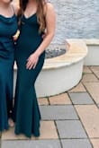 I originally bought this for my friend's gala, then wore it later in the year for a wedding. Other than it being a bit low cut for my taste, it has stretchy material making it easy to move in. I did have to get it hemmed since I'm shorter but it was an easy fix. Love this dress! - Kaitlyn W.