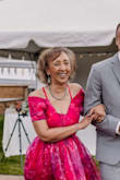 Loved the colour, had the dress shortened, modified the front to hide cleavage and covered the back with hem remnants because I was mother of the groom. - Madlen N.