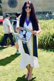 I am writing a review worthy of a pretty dress, very elegant, feminine and comfortable. I did wear for my graduation day. I like that the fabric is thick but will shape well on the body, and won't show undergarments underneath. Love my dress and will buy it in another color, as well as an extra white one. Would be so pretty if it was also made of flowy silk fabric, and if it had a baby blue color. Overall it is well-made and really worth it. Thanks, Lulus! Helped make my graduation day special. - Giovana W.
