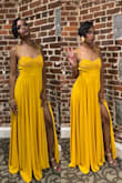This dress is beautiful. The slit was giving. I love love the color. - Trineice C.