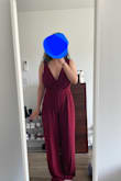 Love it! The dress is a little closer to burgundy/wine red compared to the pics, but that colour suits me so I'm pretty happy with the results! The legs run a bit long on me, even with heels on, which is fine nothing some tailoring can't fix! Because of my boob shape, they can hang low when I'm not wearing a bra but they looked great in this outfit even without a bra. The side zipper can be a little finicky; I had some trouble pulling the zipper past the waist. It didn't feel like a size issue but rather a zipper isn't strong enough issue. As a workaround, I let the top hang around my waist, fastened the clip at the top of the jumper, and then zipped it up. Once zipped, I can slide the straps on. - Jess S.