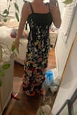 I absolutely adored this dress. It had such vibrant colors, the bows added such a beautiful touch, and it was so comfortable! I got so many compliments through the night. Highly recommend. - Anne L.