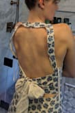 The dress itself is made well and is beautiful, loved the gold threads. It fit true to size, and looked nice in the front. I kind of wish the slit was a bit higher actually. But when I looked at the nice open back and tie in the back, the top part was so loose, as shown in the picture. It looks terrible. My torso would have to be at least 2" longer, and I think I'm pretty proportional. Unfortunately, I had to return this. - Kristy W.