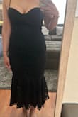 I read the reviews & couldn't figure out if I was a small or medium. Went with small first & thank goodness I did. Fits like a glove. The fabric does not have give but it [fits] me well. My torso is a little shorter & you can't really see the 'corset' details, but overall it's a cute dress. - Danah M.