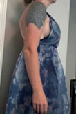 Let me start off by saying that they initiated a return thankfully. But for those looking at this dress the way I did, I want to speak my truth so you are aware.  This dress is puffy. It's still beautiful. My only issue was the bust area. No matter what I did, the bust area flared way too much and it was too revealing. There is too much fabric for that area.  I have larger breasts so you would think it would work for me but it didn't. The front also has a lunch area by the nipples that stick out. It's not flattering at all up top. - Jessica C.