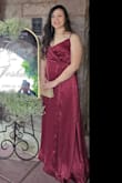 Wore this for a formal wedding, it hit in all the right places and had a nice slimming effect. Had to get it hemmed and needed good dress tape to keep the blousy bit in place. - Kassandra S.