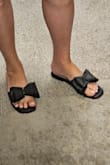 I'm going to keep these and see if I can break them in around the house, but boy are these stiff. I will add moleskin to see if that helps with the friction against my feet. So cute, though! - Alisha C.