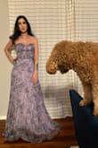 I absolutely adore this beautiful floral lavender dress! It makes me feel like a fairy princess, perfect for a summer wedding. The delicate floral design and flowy fabric are enchanting. Even though it's a bit too long for me at 5'5" and needed a trip to the tailor, it's too beautiful to part with. I'm definitely keeping it! - April M.