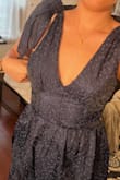 Very light fabric, lighter than I thought. It fit beautifully but unfortunately was a bit loose on the bust area. I ended up going for another dress with a lighter color since the wedding was in the morning. Nonetheless, I considered keeping the beautiful dress to [tailor] it and use it for another occasion. - Maria M.