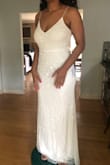 Very pretty & sparkly. I loved the subtle pattern and glitter. It just didn't love the V neckline. But the quality is so pretty. I would have needed it tailored in the waist and but other than that I believe the straps were adjustable. - Dyamond J.