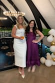 Wore this to a bridal shower and got so many compliments! The structure and style of the top are so slimming (it literally made me look ten pounds smaller)! It had just the right amount of flare at the bottom and was the perfect length on a petite girl. The tie around the neck is a littleeee rough on the skin but it was worth it! - Margaret O.