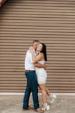 This dress is a little tight fitting, but it wasn't to the point that I couldn't fit in my normal size. If you happen to have certain assets like me, just be aware! Otherwise, this dress was perfect for engagement photos. - Shelbie B.