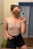 Love this comfortable and cute bodysuit! The material is thin but form fits to the body in a flattering way and is very soft comfortable. It is stretchy and is long enough of a bodysuit for my height. It is very cute in person. Perfect for summertime! - Dani M.