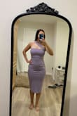 I'm usually a very true to size Medium, especially with Lulus dresses and this looked a little too snug on me. I think a L might be too big but it did run very form fitting and doesn't seem to hide much. I returned it. - Joliene P.