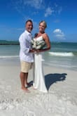 This dress was absolutely PERFECT for our wedding on the beach. The dress fit perfectly, and its simple elegance made me feel like a princess! - Kelly D.