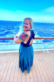 I bought this to wear for formal night on a Caribbean cruise. It was a beautiful fabric and color. I had to get it hemmed by at least 8 inches though because it was soooo long for my 5'5" self. I paid more for the tailoring than the dress but it was worth it. - Rebecca M.