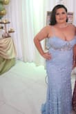 The dress fit perfectly. I received many compliments. The quality of the material was great. The only thing I would change is the bust was a little small. - Lissette R.