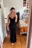 This dress is so flattering and comfortable! I'm 5'7, 36C, 150 pounds and ordered the size medium for a black tie wedding. I possibly could've gone a size up for a large but the dress is very stretchy and I think the straps would've fallen off my shoulders. The low back is so flattering and the way the dress hangs in the front, I love! - Carlie J.