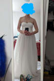 Very pretty dress, but it didn't work on my body. I have a long torso, and the bodice of this dress felt too short. It also didn't do much for my chest and bust (made my chest look bigger and my boobs look smaller). There wasn't any structure in the cups, and the stickiness at the top of the dress didn't feel like enough to prevent the dress from falling down and making me flash everyone. - Rebecca P.