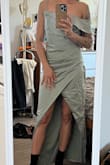 Let me start off by saying the material on this dress feels soft and thick. It's a very well-made dress. The fit is perfect, and around the bodice, it flatters me nicely. However, it feels a little too asymmetrical. If the bottom half of the dress was just as asymmetrical as the top, it might've worked. But it just feels too messy. It is also not made for someone small-chested. I really wanted to like this dress, but it just didn't work out. Based on quality and style, I still decided to settle on a 3.5 - Lyndrel P.
