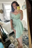I wore this to a wedding and received so many compliments on the dress! It fit so well and didn't really show much sweat ( you always gotta break it down on the dance floor). Really comfortable and a beautiful color!!! I sized up to a large. - Kathryn K.