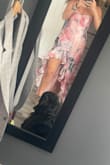 A very pretty dress, The front is a little shorter on me due to hips but overall great fit, my usual size is sm/med I purchased a small. - Marisa H.