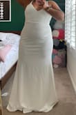 Stretchy material and easy to move in. Bought this as a reception dress! - Sharon W.