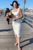Classic California summer beach wedding dress. I walked 1,853 feet down the pier in this dress, each way! It was perfect for my wedding on the pier! I felt beautiful and comfortable and fabulous in it, even though the straps fell off my shoulders a few times. I would dress it up or down and wear it again and again. I'm so happy I found it here! Lucky on Lulu! - Janelle F.