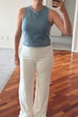 Loved the top from the pics. Weird fit though. The way the top fits and the relief lines on the sides make the chest area look very low. The side view shows the shirt is not fitted and hangs way off of your body. Will be retuning. It's sad Lulus charges $2 for trying clothes on now. - Kristen M.