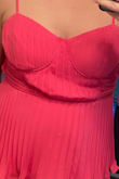 I wanted to love this but it just fit me weird. The waistline was uncomfortably snug, but then there was excess fabric under the arms, front and back. It looked like parachutes in the back LOL. I love the ruffles but the torso part of the dress just didn't workout. - Kelsey W.