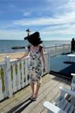 I've never received so many compliments on a dress before. It was gorgeous. I do wish the bust shape was not as "maternal". The dress was form fitting and the length is one I'd tend to not get because I'm short but it worked! - Nora M.
