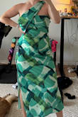 I'm a true size 12/L and this dress was a tad snug. Still love it, the cinched waist is flattering. The strap makes me feel like I'm wearing a sash though. - Carly D.
