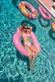 For a weekend in Palm Springs at a pink motel I wanted something with a cute, barbie, coquette vibe and this bikini was perfect for the setting! The top is comfortable and flattering and the fabric is high quality. The only issue is that its a bit hard to lay the buckle in the back flat, but after a few tries I got it. - Amanda L.