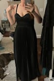 The fabric is beautiful and the top is very flattering for my bust. The Floy bottom will hide any extra curves. The length is quite long, so maybe not recommended for the short gals as I am 5'6". - Jennifer M.
