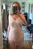 I LOVE this dress, but had to return. It fit like a dream and definitely had stretch. My upper body is tiny and my hips are wide and this dress fit both perfectly. I felt amazing in it. BUT it's way too short. It literally didn't cover my buttocks (see pic). Its so sad because I loved it. Really wish Lulus would listen to their customers and make things longer. - Alexis P.