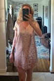I got this as a possible Eras tour dress but returned it. It is cute, but short and didn't do anything for me. Sequins fell off everywhere just trying it on (still finding them a week later). So short I wouldn't have been able to lift my arms without flashing people. - Alexis P.