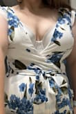This dress is so low cut that your entire front of your bra will be showing. Going braless? They will probably be flapping all over the place. If you have more than an A cup you will have to make adjustments or just avoid. I ordered size large and have a pretty large bust. - Marissa T.