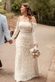 Absolutely happy with this dress I picked for my wedding, I added a rhinestone belt I purchased from Amazon. Just absolutely beautiful and it fit perfectly! Zero alterations needed. I'm 5'4 and normally wear a Large in all Lulus apparel. I weigh 176 lbs. - Maria M.