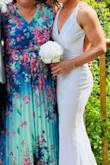 I bought this dress for a small family civil service wedding. I did not know what to expect when buying my wedding dress online, but I could not be more happier with what I received. The dress quality was amazing, and I got so many compliments. I would highly recommend this dress, as I looked and felt amazing. - Caroline B.