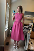 I wore this dress to my friend's bridal shower and I got a lot of compliments on it! I was a little nervous about how the cutouts would lay, but I think it looked good! The material around the waist does not have much stretch so it definitely fits somewhat snug. I usually wear a small, which is the size I ordered, but sometimes need to size up to a medium depending on the fit. Overall, I would recommend! - Kelli D.