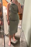 She fits absolutely perfectly! I do recommend getting tape to stick the side to your boobs because if I bend forward, it shows almost my whole boob. Maybe if you're bigger-chested, it'll fill it out a little more and won't have to worry about that? - Calli D.