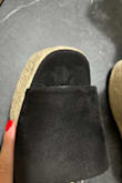 I was so looking forward to these and read almost every review just to make sure I get the size right. I wear a size 8.5 in pretty much every shoe. Because I have wide feet, I prefer to size up than down, but not with sandals. I got these in a size 9. Not only did I have to squeeze my foot in to walk in them around the apartment, but they were SO uncomfortable due to the strap. It's not stretchy at all and cuts into the skin. On top of that, they arrived looking like you can see in the photos I've attached. Very disappointing. - Nathalie M.
