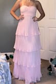 I'm usually somewhere between a small and medium so with this dress being strapless I ordered a small and it fit perfect! Doesn't feel like I'll be pulling it up all night. - Mary N.