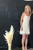 This dress is so adorable! The material is like linen so very comfortable and surprisingly did not wrinkle very much even after wearing it all day! - Miranda V.
