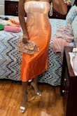 I bought a size large, fits perfectly!! Love the sunset colors. This dress screams summer :) - Shanelle L.